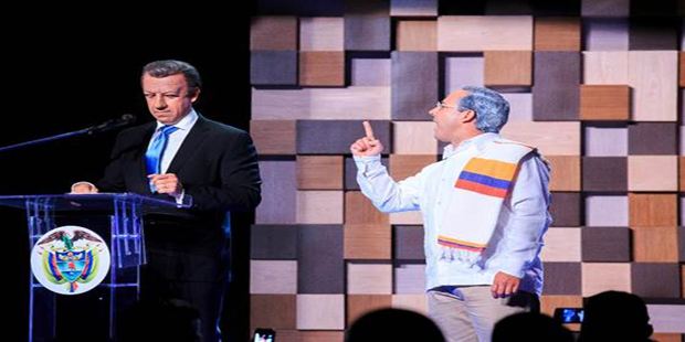 Óscar Iván Castaño (Presidente Santos), y Andrés Tamayo (ex presidente Uribe).